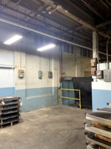 Interior painting services industrial building in Massachusetts.